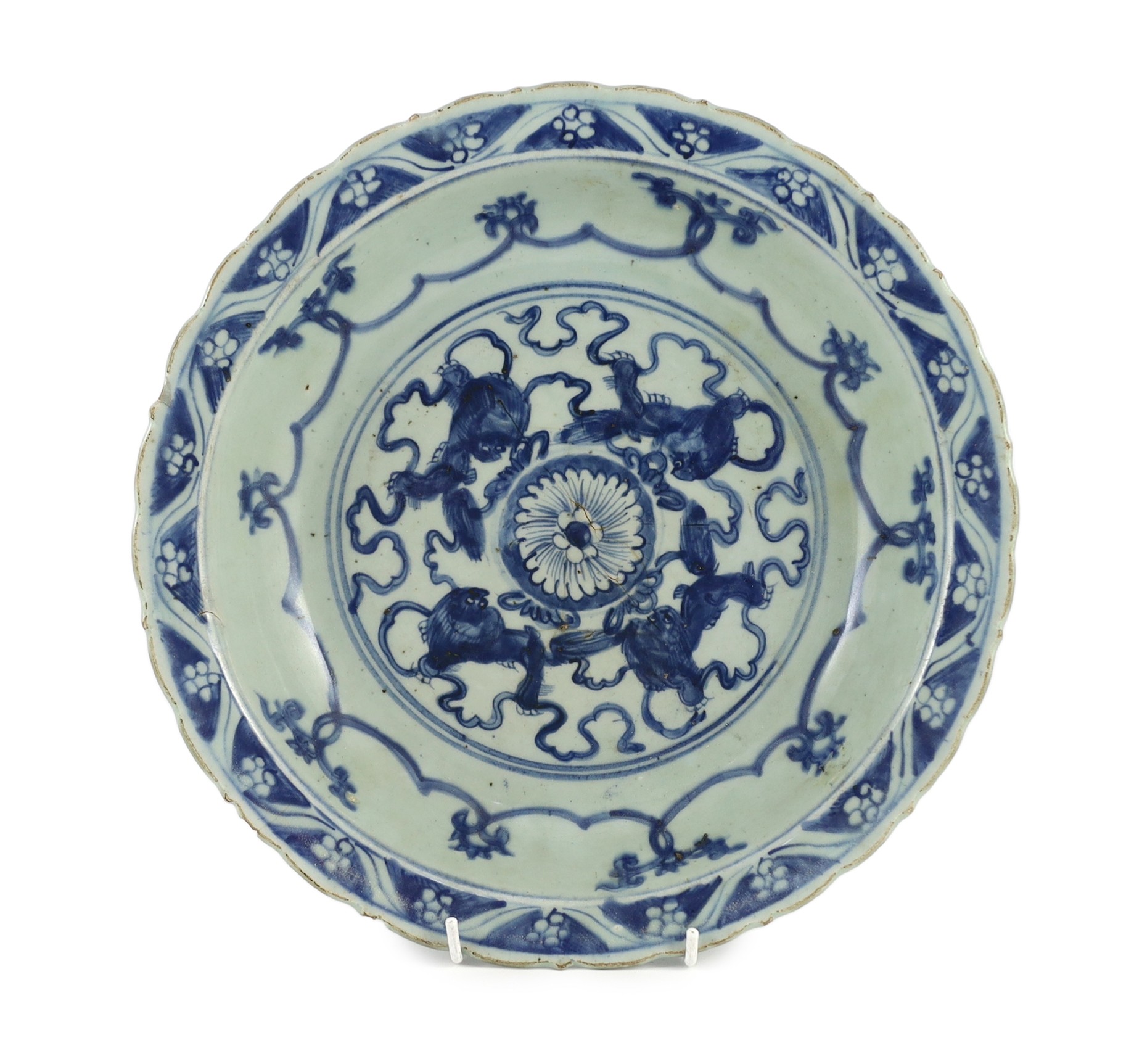 A Chinese Ming blue and white ‘lion’ dish, four character Ming mark, 31cm diameter, chip and cracks